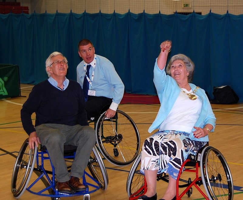 Cllr Janet Biggins (right) tries her hand at wheelchair basketball.