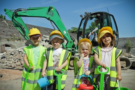 Children watch work getting under way at the Old Barns site in Stoke Gifford.