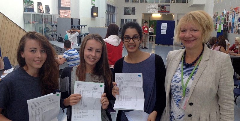 Students at Abbeywood Community School celebrate their GCSE results.