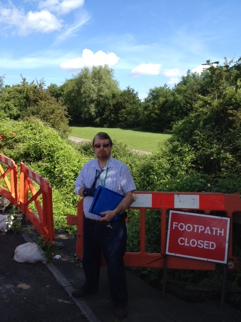 Cllr Keith Cranney beside a landslip on Station Road, Little Stoke.