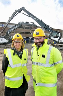 Amanda Deeks (chief executive of South Gloucestershire Council) and James Digby (director of Ashfield Land) mark the formal start of site clearance and demolition at The Approach, Hunts Ground Road, Stoke Gifford, Bristol.