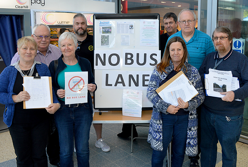 Photo of campaigners opposed to a new bus lane on Hatchet Road, Stoke Gifford, gathering petition signatures at the Willow Brook Centre.