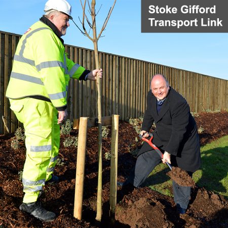 Photo of Cllr Matthew Riddle planting a tree.