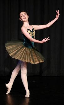 Photo of Grace Cousins dancing.