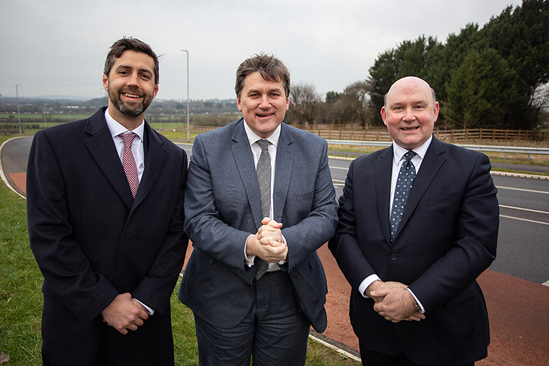Photo of Cllr Toby Savage, Kit Malthouse and Tim Bowles standing beside the new Stoke Gifford By-Pass.