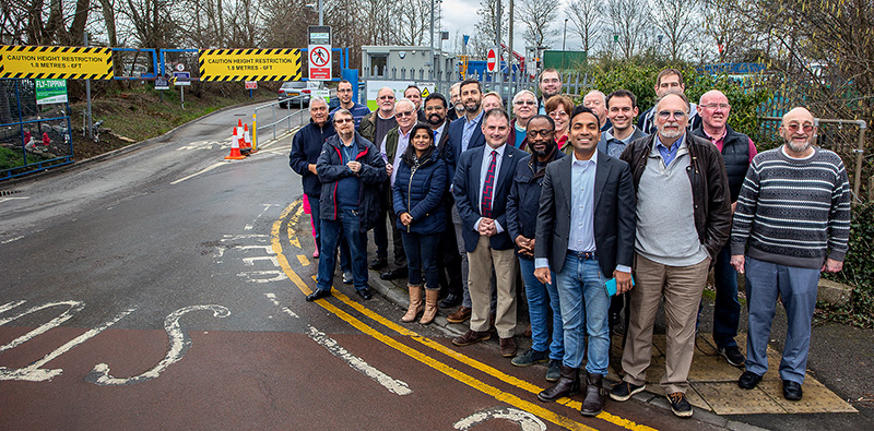 Photo of Conservative councillors standing at the entrance to Little Stoke Sort It Centre.