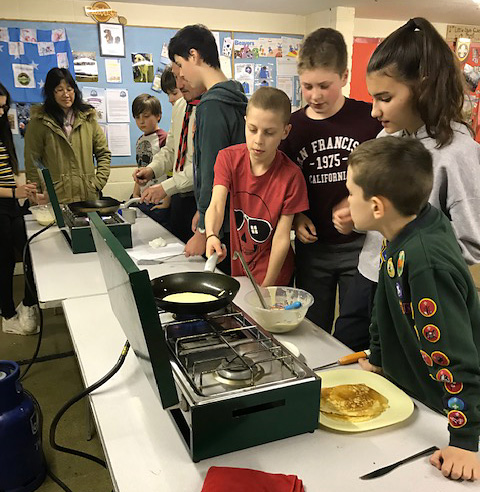 Photo of pancake cooking at 1st Little Stoke Scouts.