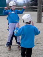 Photo of Beaver Scouts trying out the low ropes activity.