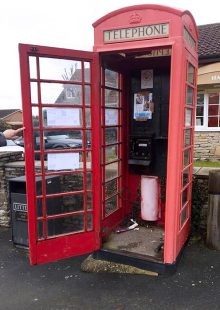 Photo of a disused red telephone box on North Road.