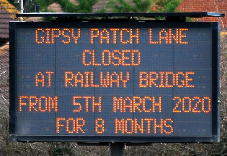 Photo of a dot matrix road sign informing of the closure of Gipsy Patch Lane for 8 months.