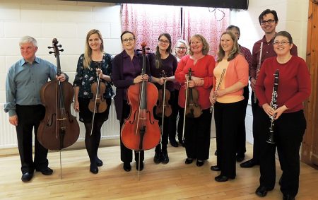 Photo of members of The Gifford Ensemble with their instruments.