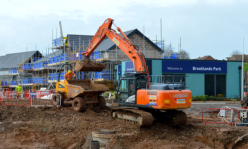 Photo of construction activity at Brooklands Park, showing the soon-to-open marketing suite.