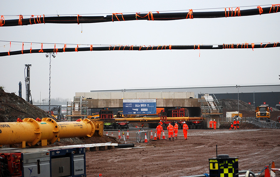 Photo showing the new bridge about to be brought in.