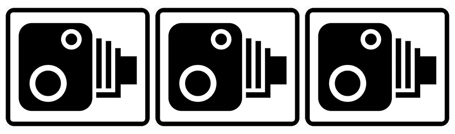 Speed camera signs.