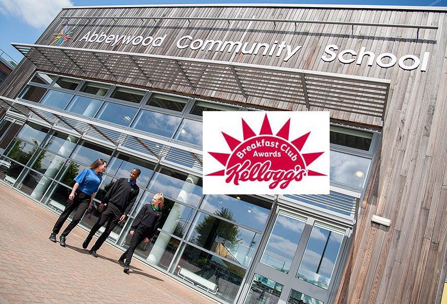 Kellogg's Breakfast Club Awards logo superimposed on a photo of Abbeywood Community School.