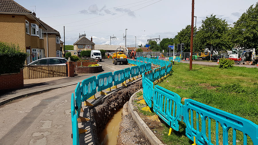 Photo of an excavation trench with barriers.