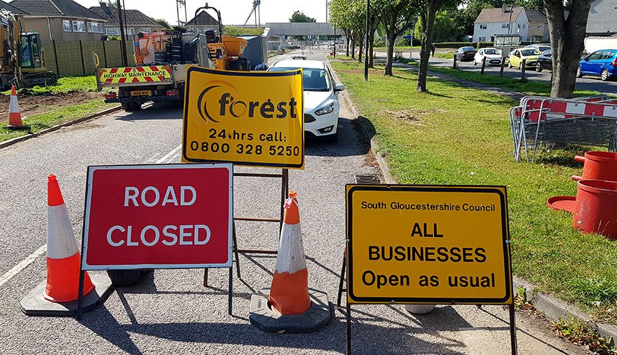 Photo of road closure signs.