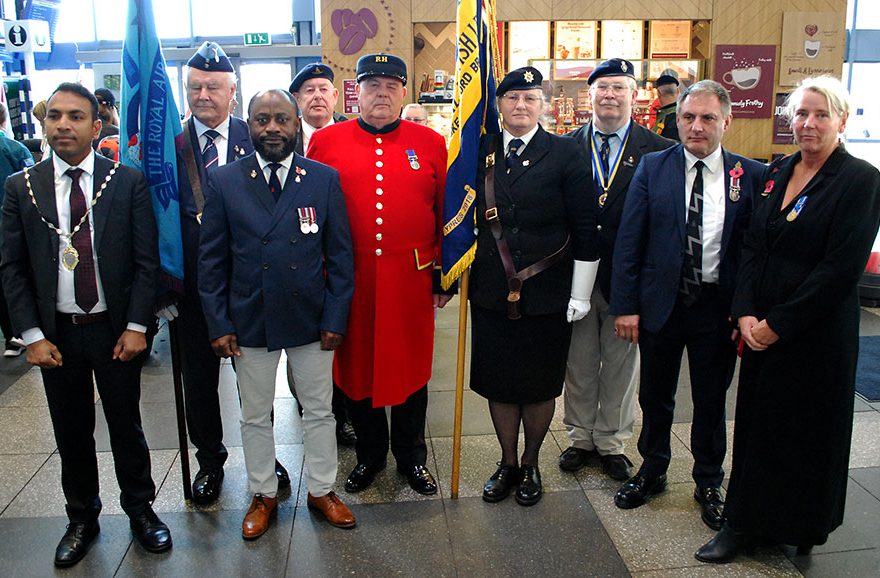 Photo of a group of nine people.