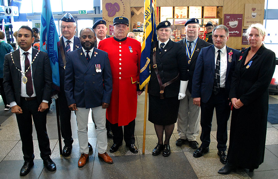 The Stoke Gifford Royal Brtish Legion branch's 2021 Poppy Appeal Launch at Parkway Station. Photo of a group of nine people.