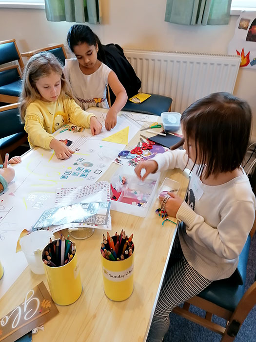 Photo of children taking part in a craft activity.