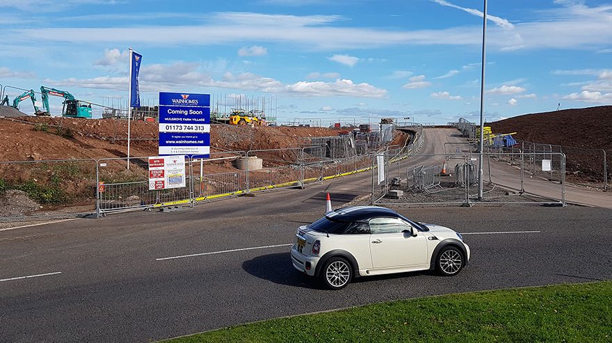 Photo of the entrance to a housing development.