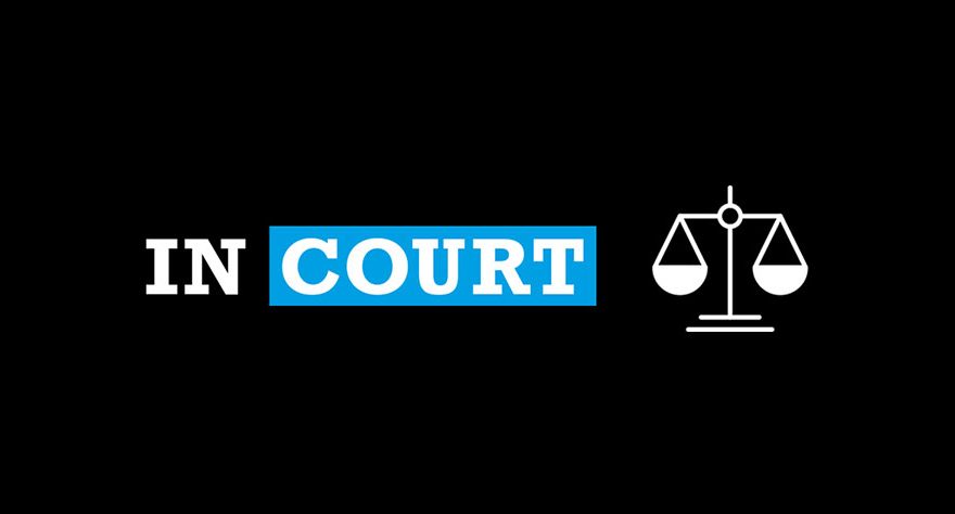 Graphic showing scales of justice with the words 'In court'.