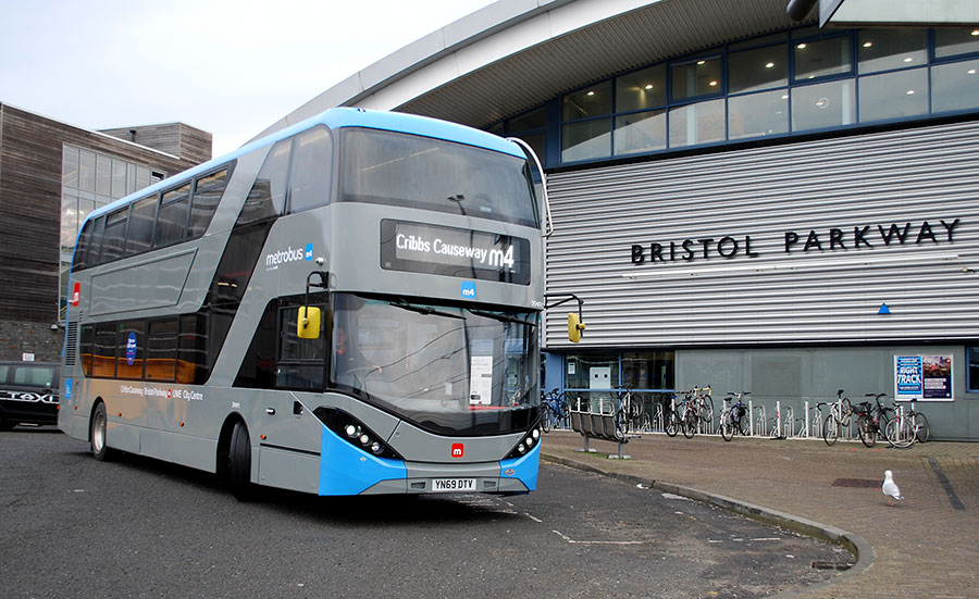 Photo of a bus approaching a stop at Bristol Parkway Station.