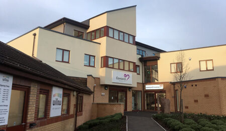 Photo of the exterior of a medical centre building.