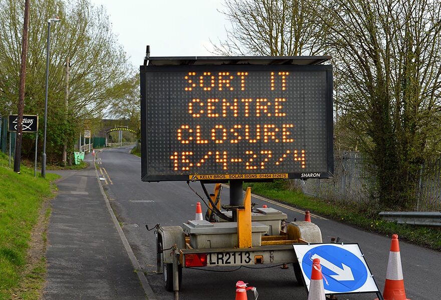 Photo of a dot matrix sign displaying the words "Sort It centre closure 15/4-27/4".